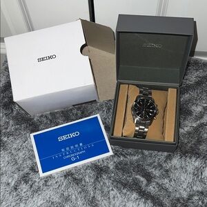 Seiko Black Dial Silver Band Watch